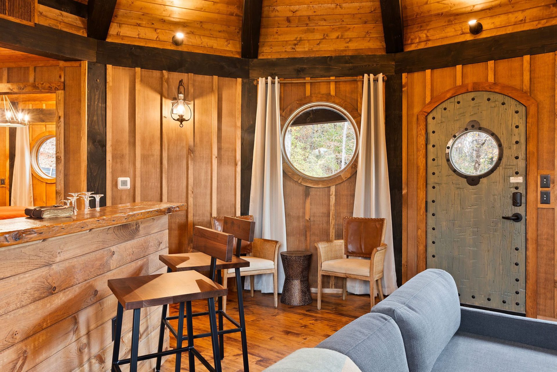 Elven Treehouse kitchenette bar with live-edge counter and cedar-clad walls