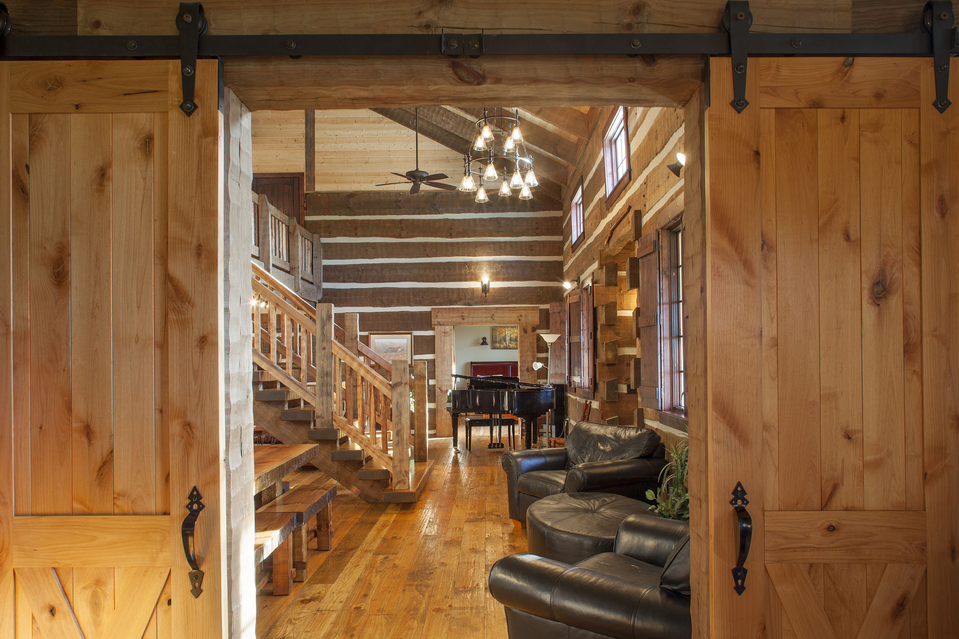The Tom Thompson, MD Log Home — reclaimed hand-hewn logs, ridgetop pasture, Tennessee