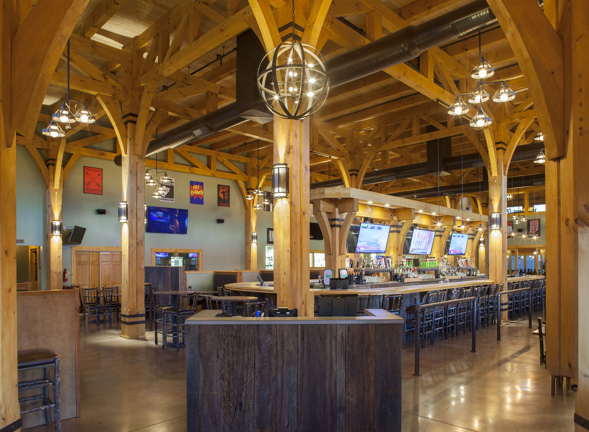 Big Woods Speedway — curved timber braces above the bar rail
