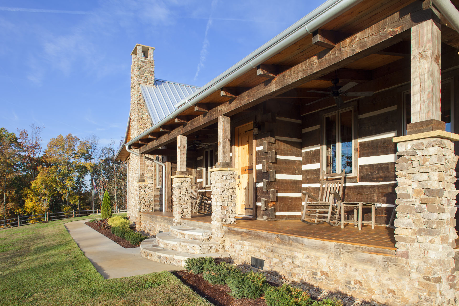 The Tom Thompson, MD Log Home — reclaimed hand-hewn logs, ridgetop pasture, Tennessee