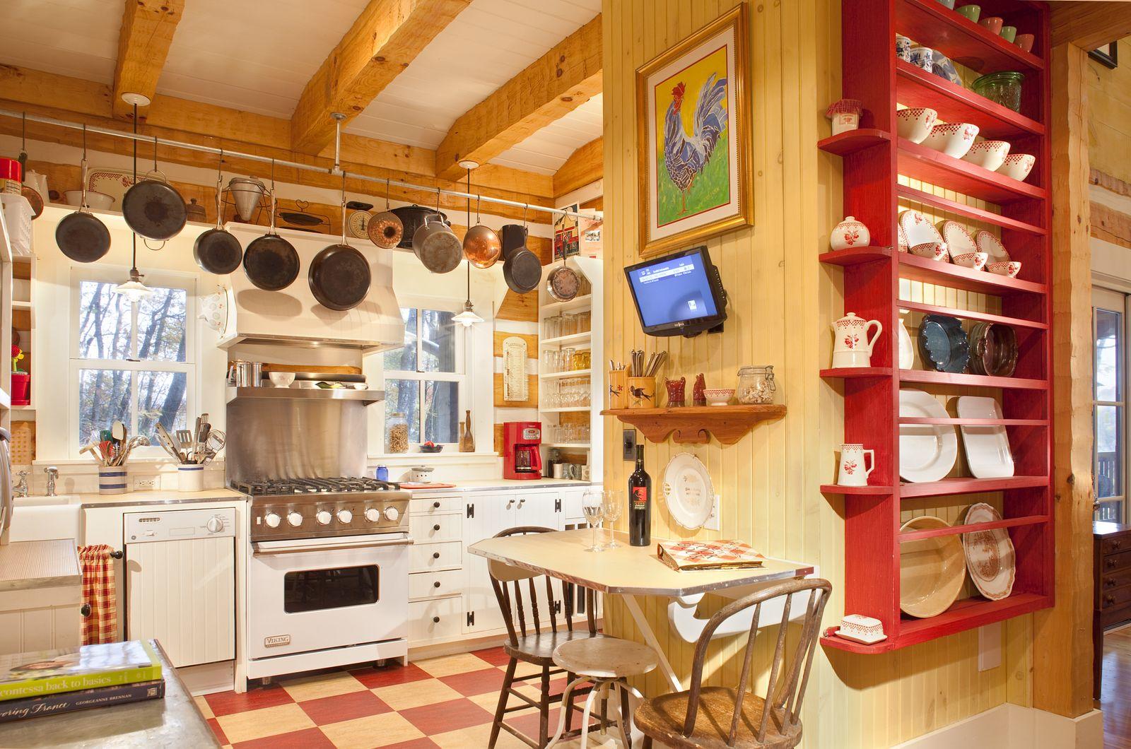 Hughes log home — hearth and stacked-log wall