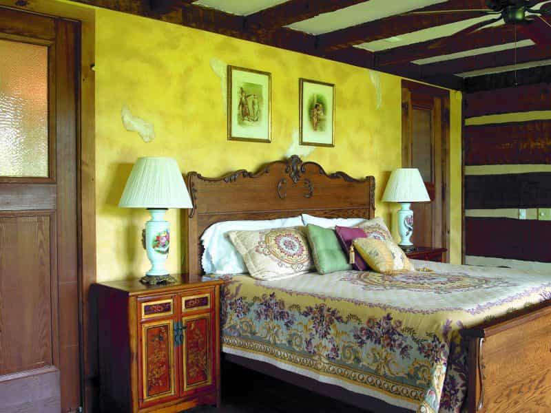 The Green Family Log Home — hand-hewn logs, aged interior finishes, Tennessee