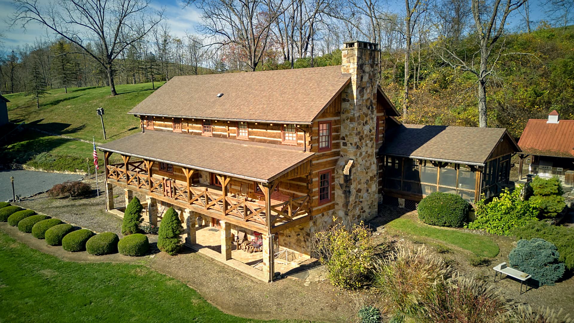 Outdoor stone fireplace terrace off the house