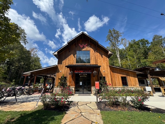 WildSide Adventure Park — heavy timber barn exterior with board-and-batten gable, East Tennessee