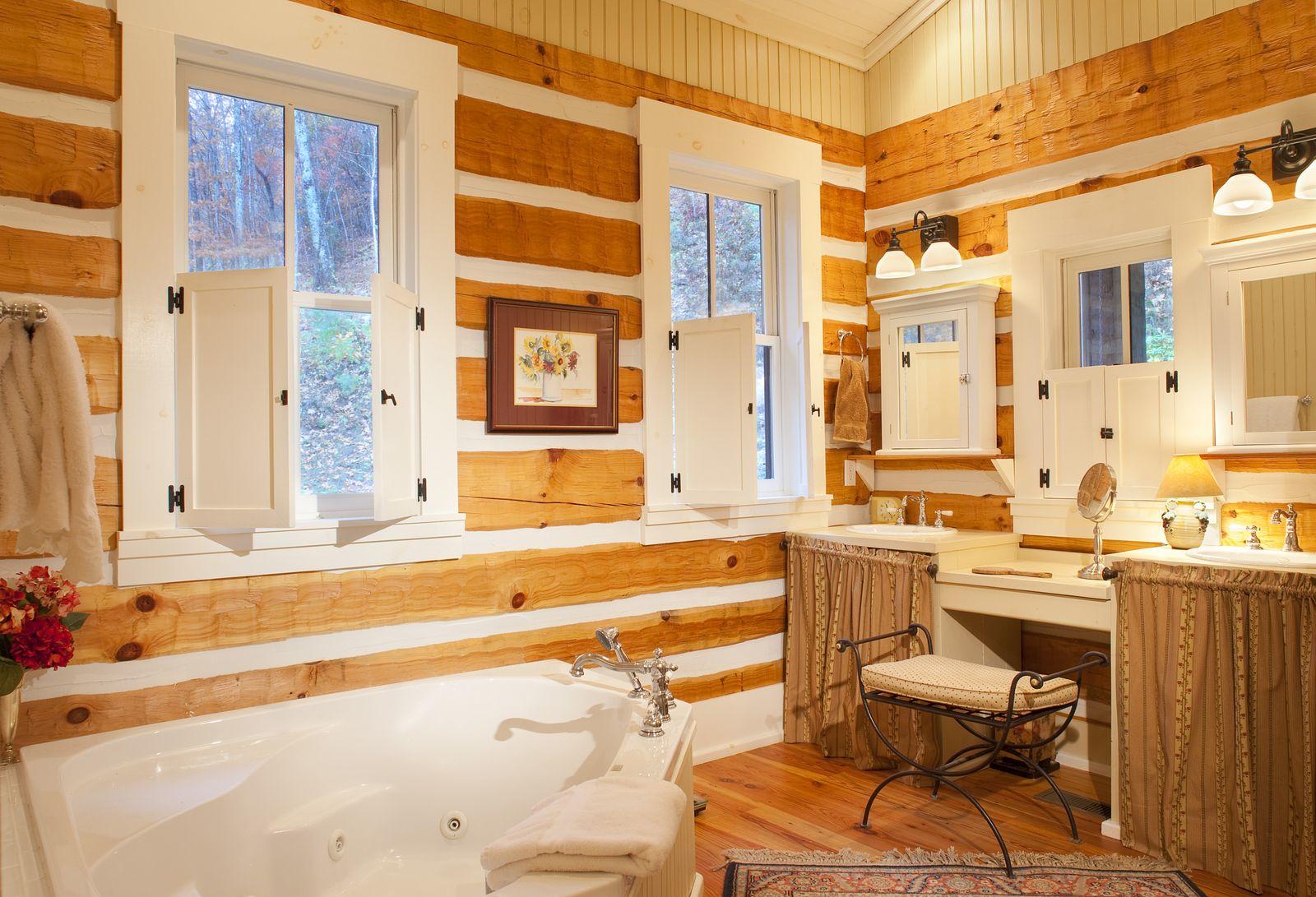 Hughes log home — gable and stone chimney