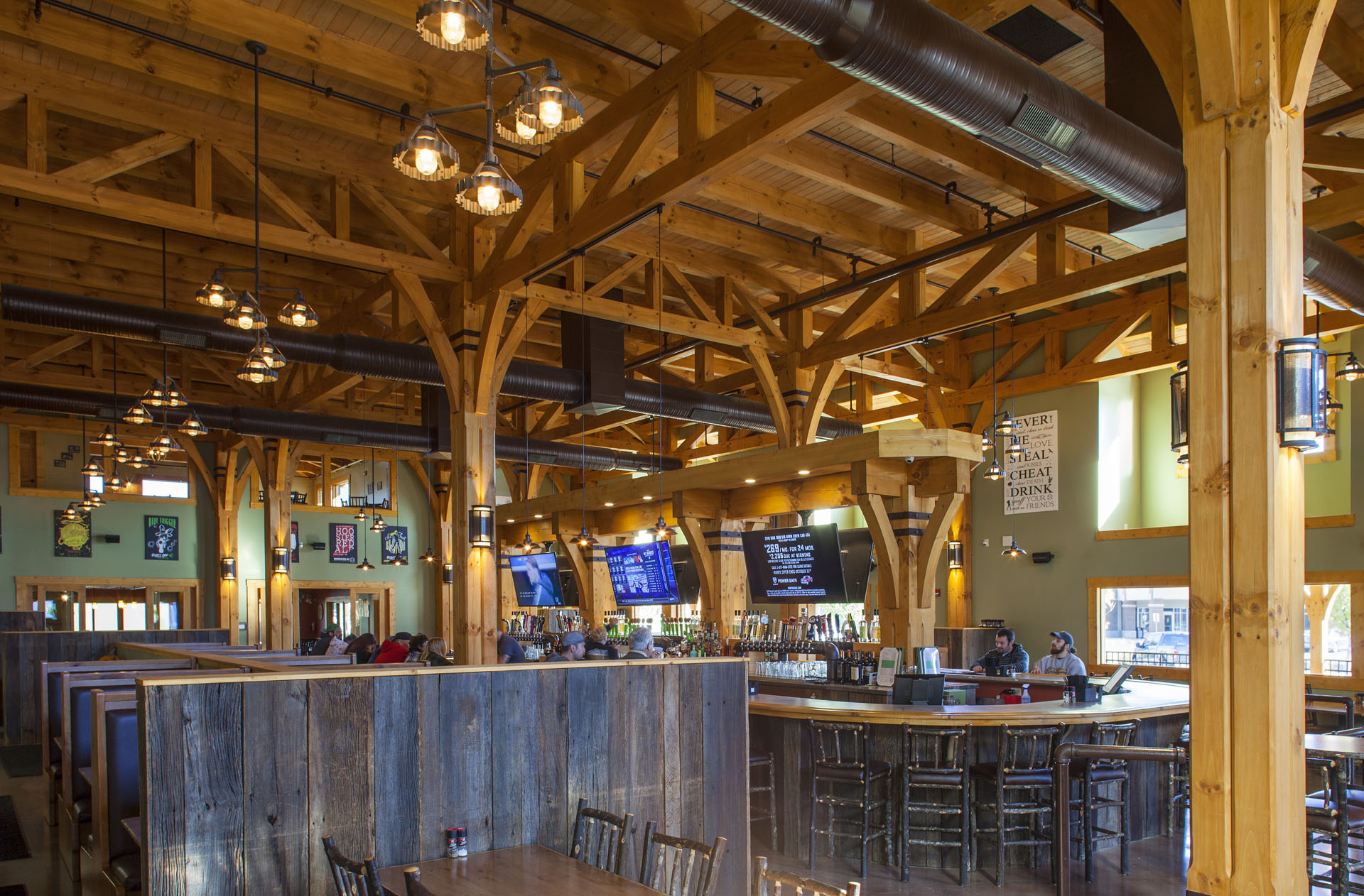 Big Woods Speedway — dining room seating beneath exposed trusses