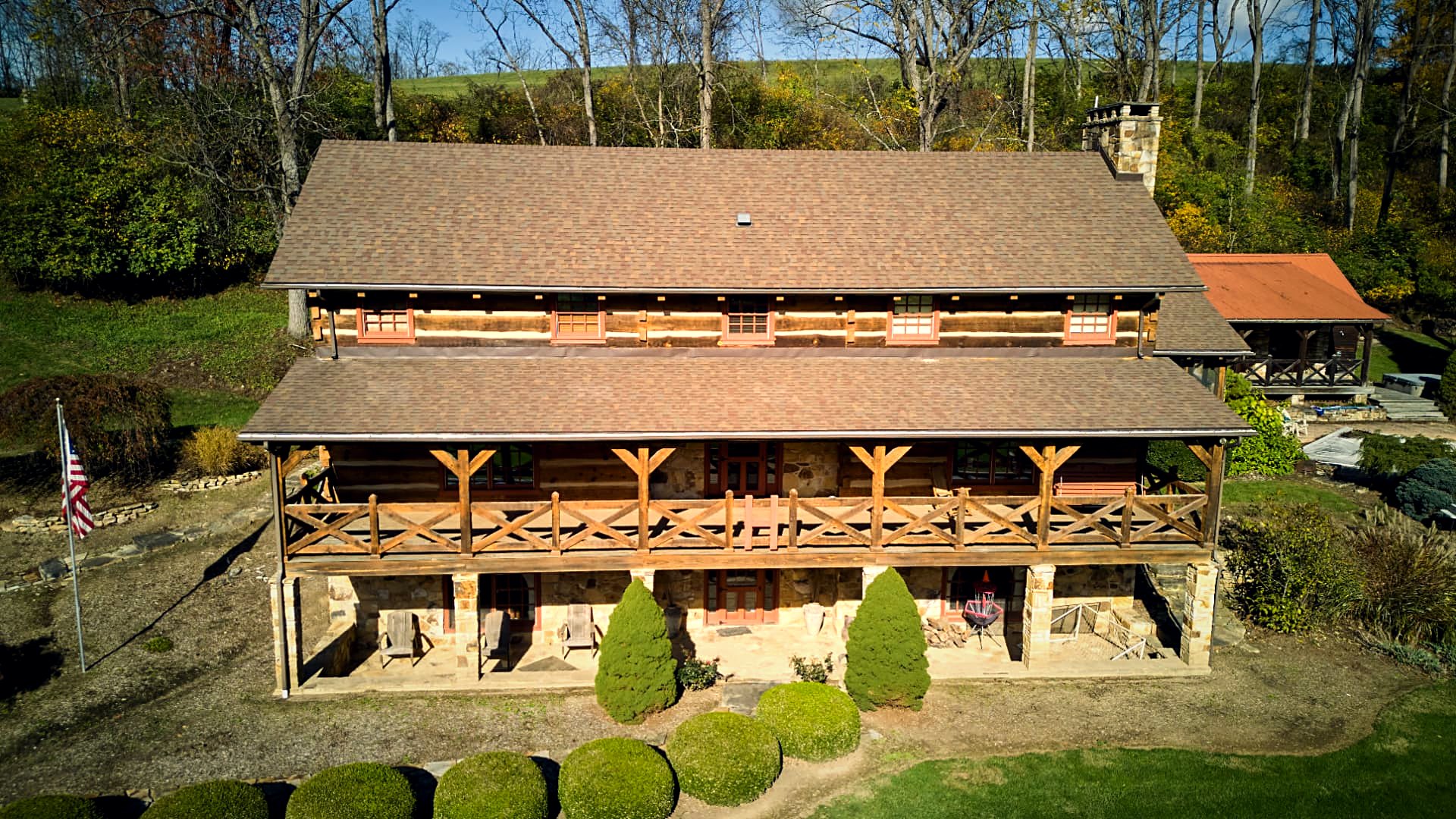Symmetrical aerial elevation of the main log home