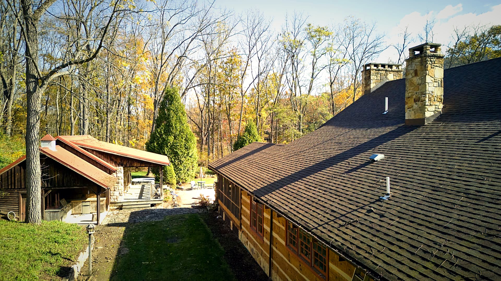 Stone chimneys and the seam where log wall meets timber frame