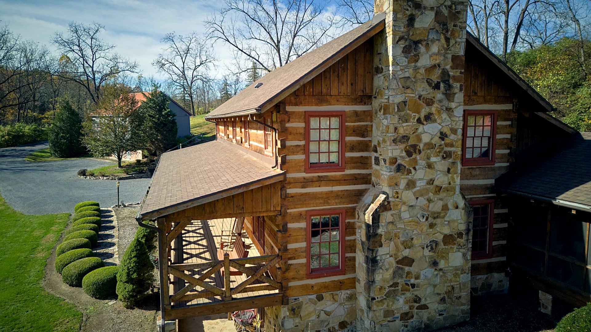 The main chimney mass and gabled roofline from above