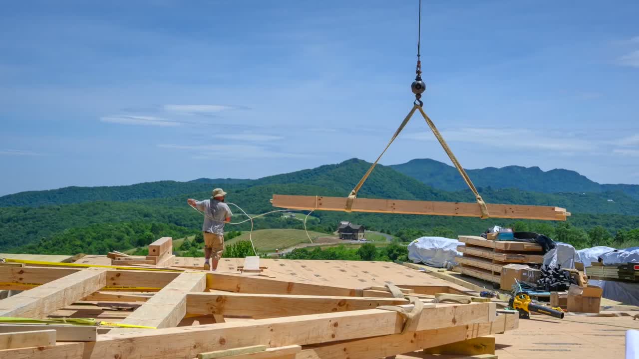 Hearthstone crew raising a heavy timber frame