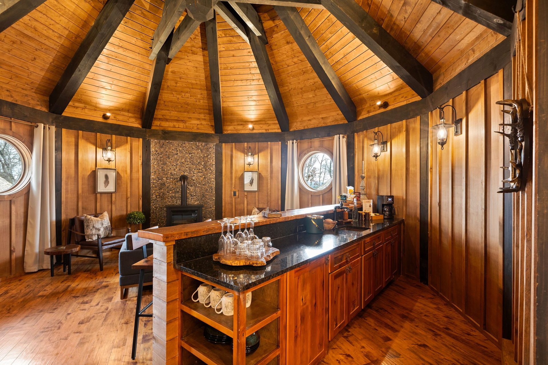 Elven Treehouse kitchen island beneath the faceted rafter dome of the suite