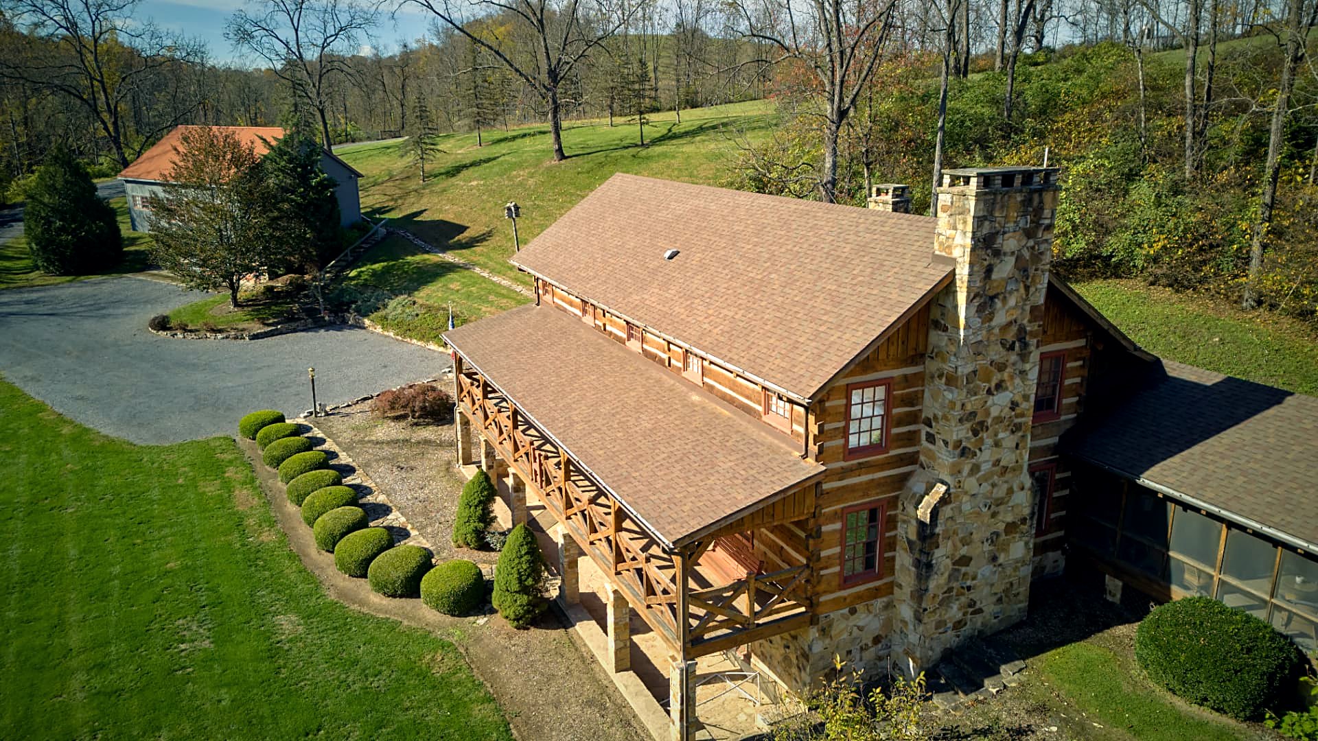 The facade above the lawn and shrub line