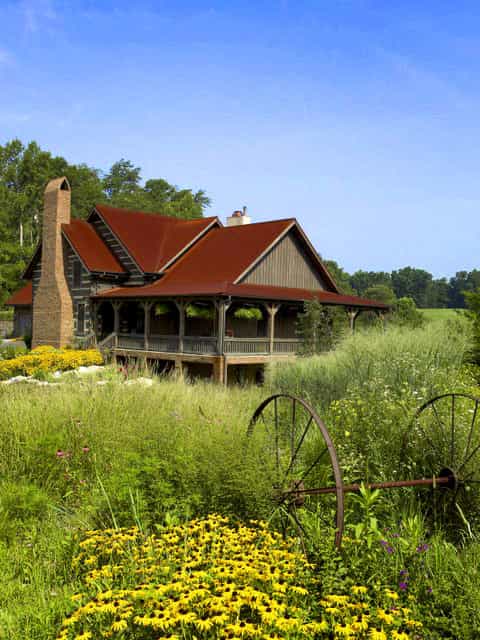 The Green Family Log Home — hand-hewn logs, aged interior finishes, Tennessee