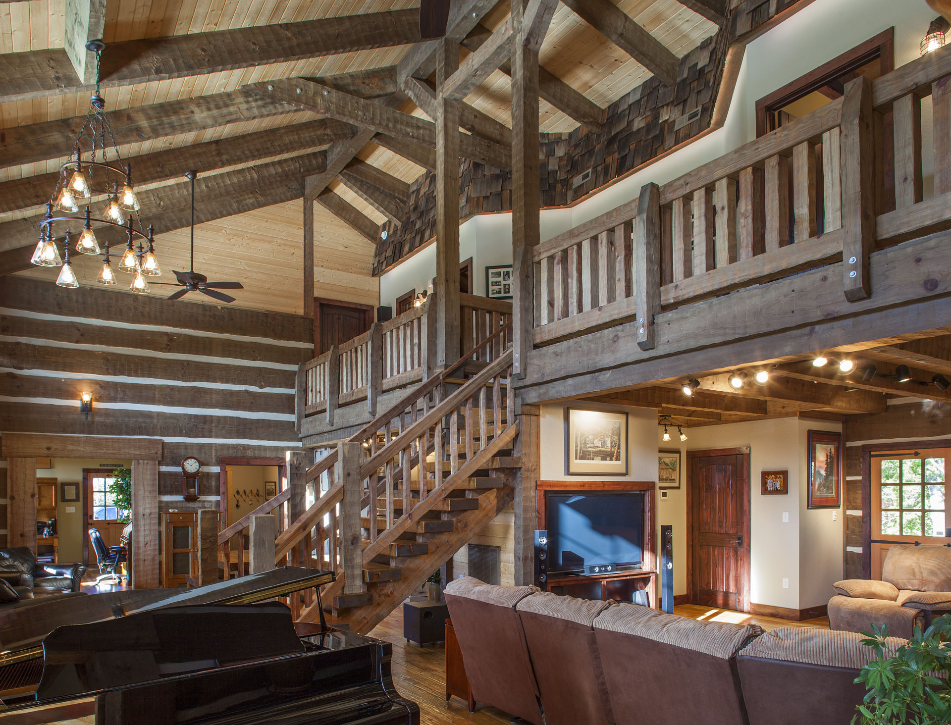 The Tom Thompson, MD Log Home — reclaimed hand-hewn logs, ridgetop pasture, Tennessee