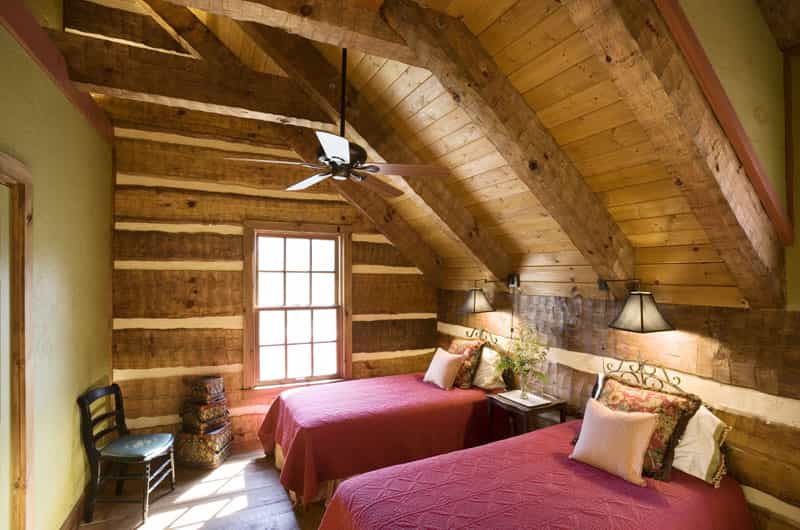 The Green Family Log Home — hand-hewn logs, aged interior finishes, Tennessee